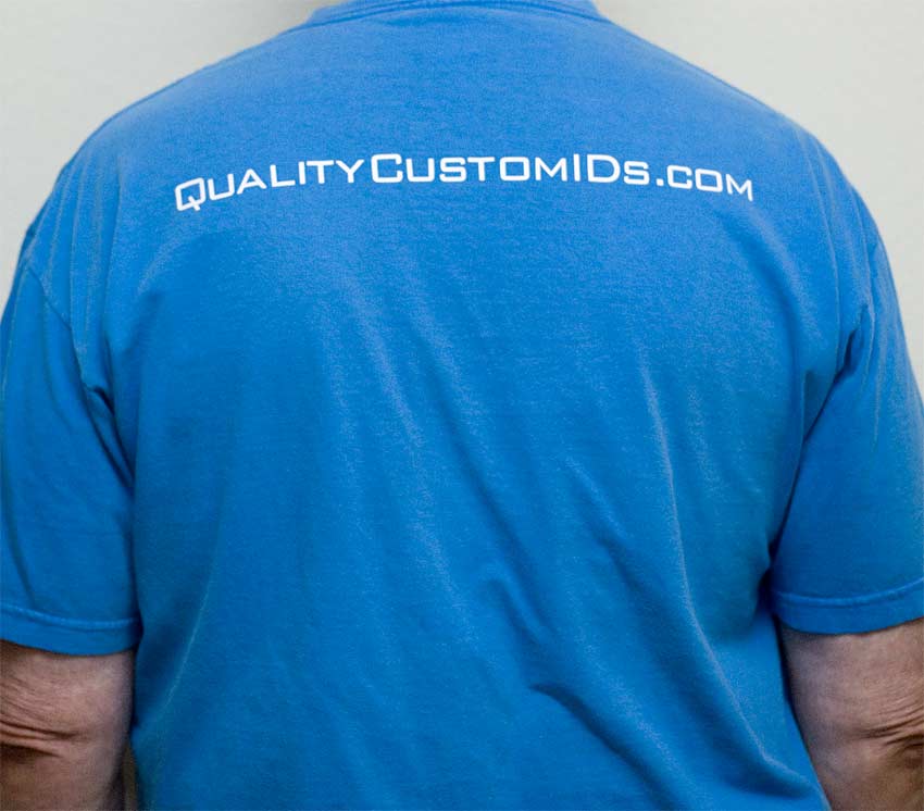 White Vinyl Logo on Blue Shirt